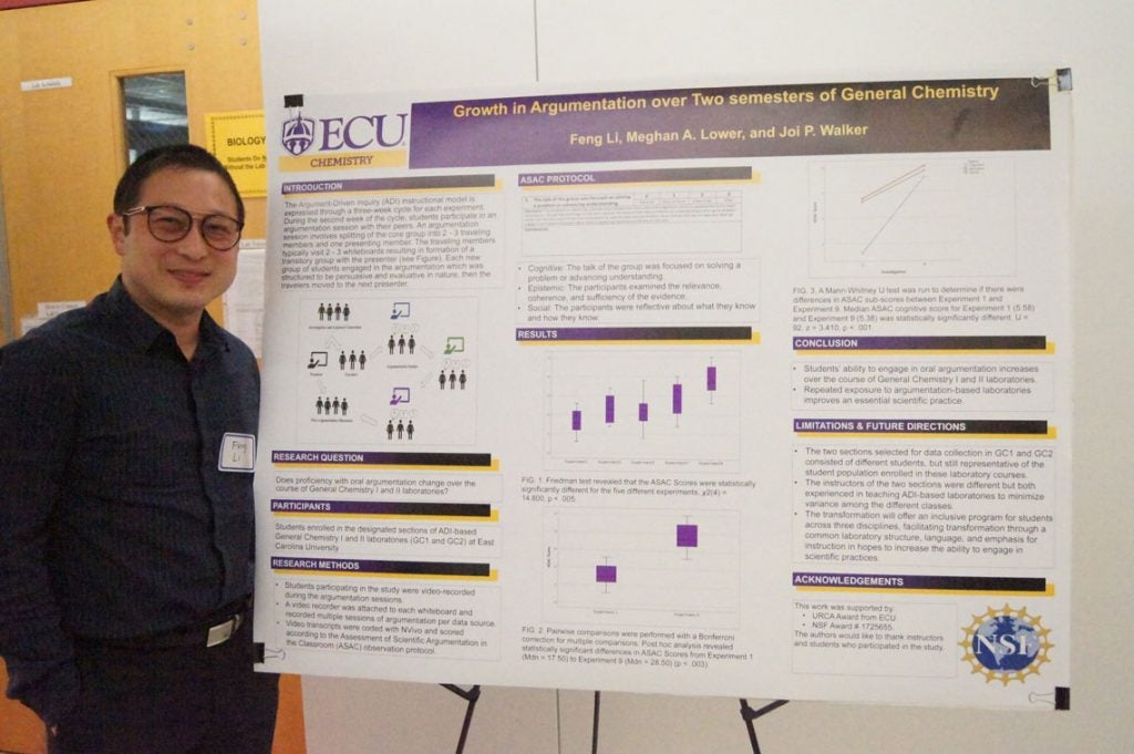 Feng Li standing with his poster about Growth in Argumentation over Two semesters of General Chemistry.